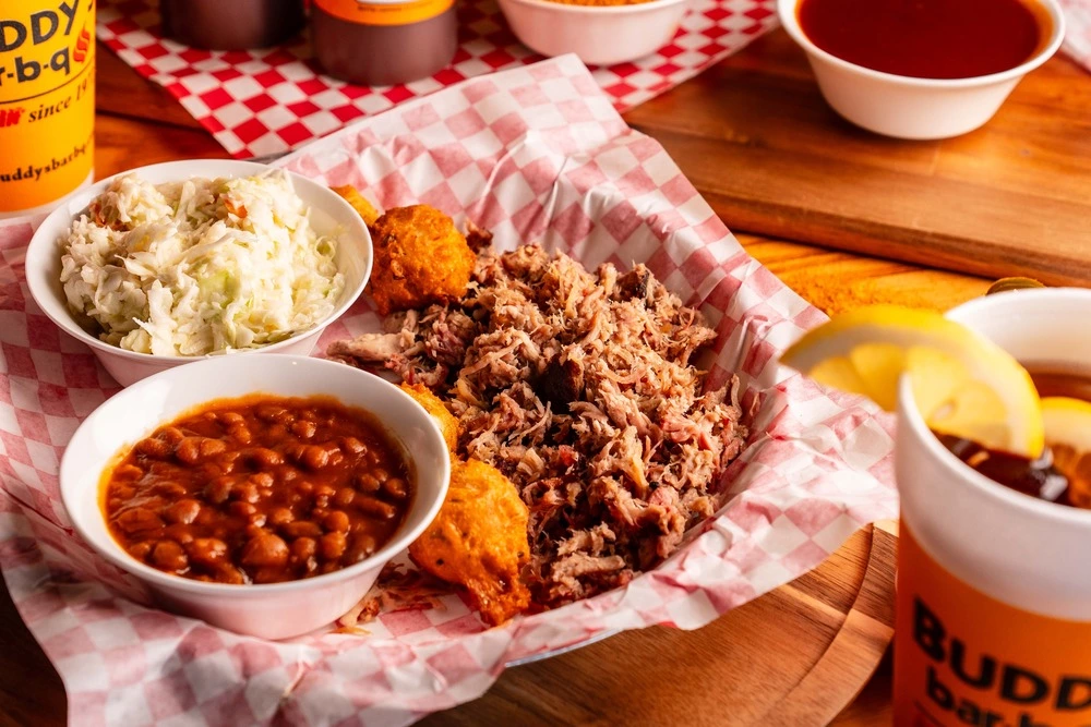 pulled pork dinner with sides and drink
